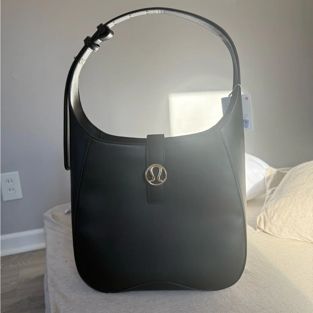NWT Lululemon Black Leather Altnerative Shoulder Bag with Gold Emblem - Picture 1 of 4